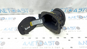 The fuel filler flap housing of a Ford Fusion mk5 13-20 is locked and the seal is torn