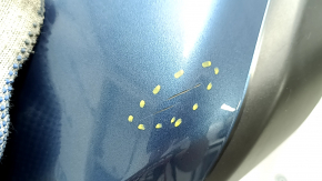 The rear bumper lip of the Mazda CX-5 22-25 is blue, torn, cracked, missing fragments, scratches