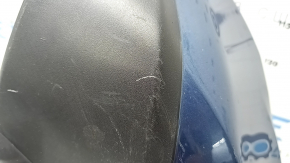 The rear bumper lip of the Mazda CX-5 22-25 is blue, torn, cracked, missing fragments, scratches
