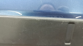 The rear bumper lip of the Mazda CX-5 22-25 is blue, torn, cracked, missing fragments, scratches