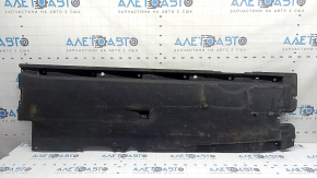 The front right underbody protection of the Audi A6 C8 19-25 is worn out
