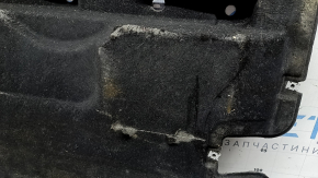 The front right underbody protection of the Audi A6 C8 19-25 is worn out