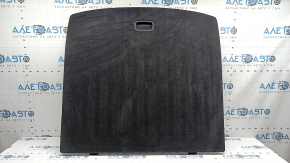 The trunk floor of the Jeep Grand Cherokee WL 22-26 is black, there are scratches on the handle, and a tear