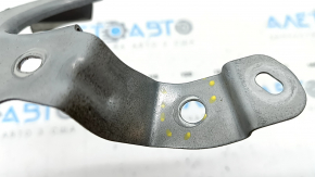 The BSM blind spot sensor bracket, right, Mazda CX-5 17-25, is dented