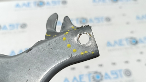 The BSM blind spot sensor bracket, right, Mazda CX-5 17-25, is dented