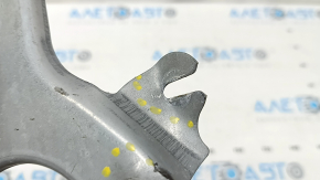 The BSM blind spot sensor bracket, right, Mazda CX-5 17-25, is dented