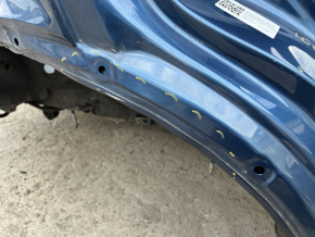 Right rear fender dent on Mazda CX-5 17-25 body, blue, dented