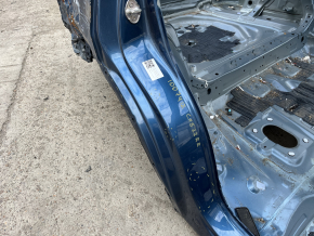 Right rear fender dent on Mazda CX-5 17-25 body, blue, dented