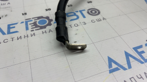The battery cable is pressed through the entire body of the Porsche Macan 15-26
