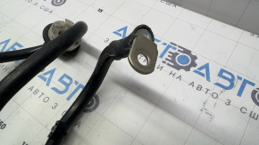 The battery cable is pressed through the entire body of the Porsche Macan 15-26