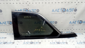 Rear left fixed window glass Jeep Grand Cherokee WL 22-24 tinted, gloss black with chrome molding, scratches