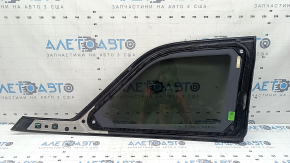 Rear left fixed window glass Jeep Grand Cherokee WL 22-24 tinted, gloss black with chrome molding, scratches