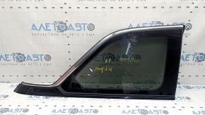 Rear right fixed window glass Jeep Grand Cherokee WL 22-24 tinted, gloss black with chrome molding, scratches