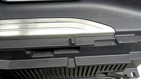 Left arch trim for Toyota Venza 21-24, black, for JBL subwoofer, with chrome trim, scratches, tear, needs cleaning