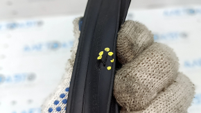 Subaru Forester 25-26 rear left door seal, lower, large, fasteners are torn