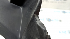 The right windshield wiper seal for Subaru Forester 25-26 is dented