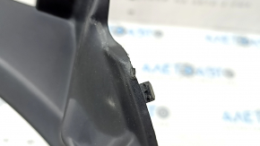 The right windshield wiper seal for Subaru Forester 25-26 is dented