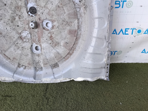 The trunk trough of Nissan Rogue 14-20 2.5 is drilled out