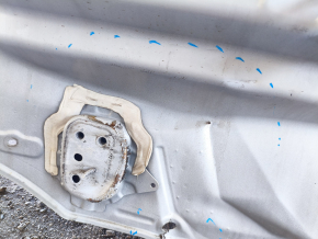The rear panel of the Toyota Venza 21-24 on the body is dented