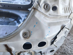The rear panel of the Toyota Venza 21-24 on the body is dented
