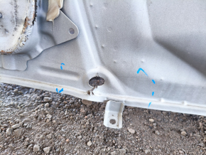 The rear panel of the Toyota Venza 21-24 on the body is dented