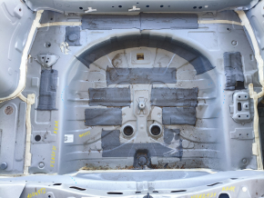 The trunk trough of Toyota Venza 21-24 on the body is dented