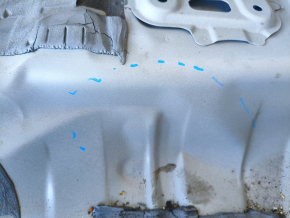 The trunk trough of Toyota Venza 21-24 on the body is dented
