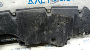 The front bumper guard for Toyota Venza 21-24 is dented, worn, and the mount is broken