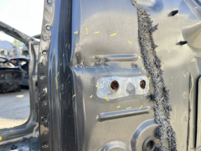 Front right quarter of Ford Edge 19-24 on the body, graphite, dented, tears, broken bolts