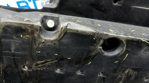 The front left underbody protection of Toyota Venza 21-24 is dented and worn