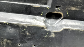 The front left underbody protection of Toyota Venza 21-24 is dented and worn