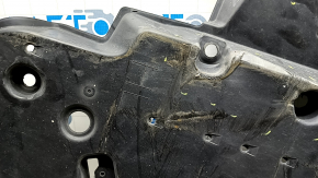 The front left underbody protection of Toyota Venza 21-24 is dented and worn