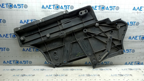 The front left underbody protection of Toyota Venza 21-24 is dented and worn