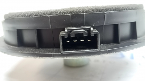 The rear right door speaker of Ford Escape MK4 20-26 is dented