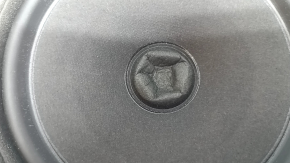 The rear right door speaker of Ford Escape MK4 20-26 is dented
