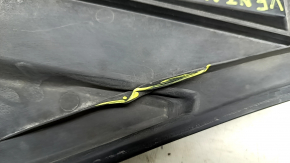 The front right underbody protection of Toyota Venza 21-24 is dented and cracked