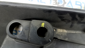 The front right underbody protection of Toyota Venza 21-24 is dented and cracked