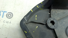 The front right underbody protection of Toyota Venza 21-24 is dented and cracked