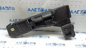 The right trunk tray of Ford Escape MK4 23-26 is dented