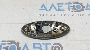 The FORD logo emblem of the Ford Edge 19-24 trunk door has a broken guide