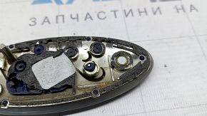 The FORD logo emblem of the Ford Edge 19-24 trunk door has a broken guide