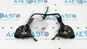 The control buttons on the steering wheel of a Subaru Forester 25-26 are broken