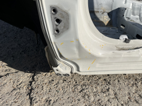 Front left quarter panel of Subaru Forester 25-26 on the body, white, dented