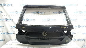 The trunk door is bare VW Tiguan 18-24 black LC9X, dented