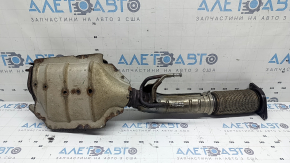 The exhaust pipe with a catalytic converter for Infiniti QX50 19-22 has a torn mesh and is rusty
