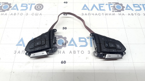 The steering wheel control buttons of the VW Tiguan 22-24 are black and grey, like a radar