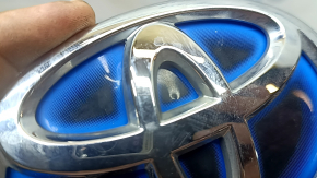 Emblem logo of the trunk lid of Toyota Camry v70 18-24 HYBRID, pokes, crack