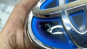 Emblem logo of the trunk lid of Toyota Camry v70 18-24 HYBRID, pokes, crack
