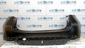 The bare rear bumper of a Mazda CX-5 22-25 without parking sensors.