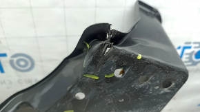 The rear right underbody protection of Toyota Camry v70 18-24 hybrid is dented